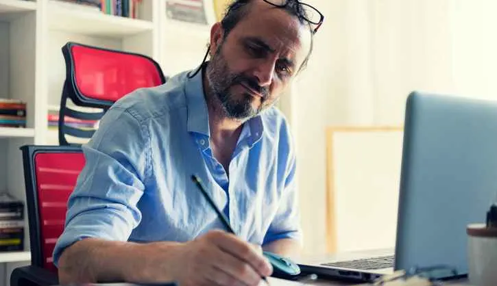 Home service business owner taking notes