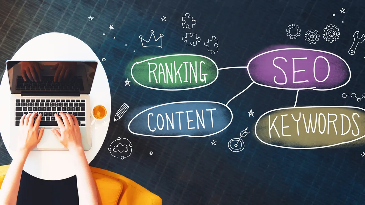 SEO concept with person using a laptop