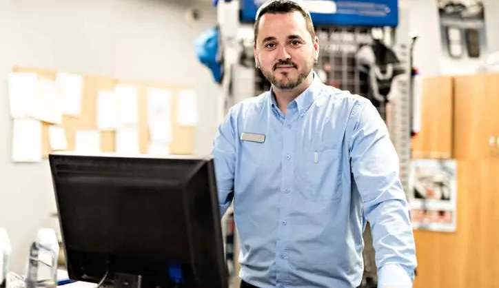Home Service business owner with computer